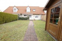 Blick vom Garten aufs Haus RE/MAX **H�bsches Reihenmittelhaus f�r Familien**Top gepflegt**sofort einzugsbereit++