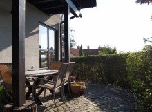Terrasse Idyllisch gelegenes Einfamilienhaus mit Einliegerwohnung und 20 Obstsorten im Garten